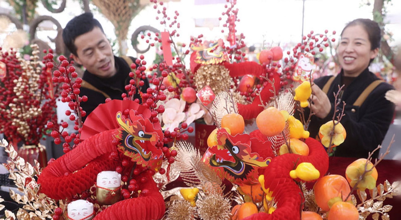 从年年有“鱼”到“花”团锦簇 各地供销两旺热热闹闹迎新年