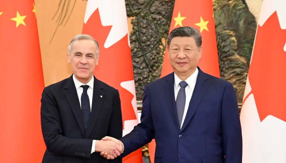 习近平会见加拿大总理卡尼